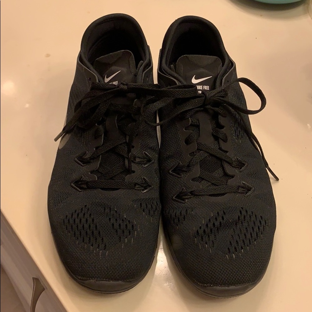 Women’s Nike Free size 7 1/2 black sneaker $15